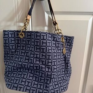 LN Tommy Hilfiger Blue shoulder bag/tote with gold accents.